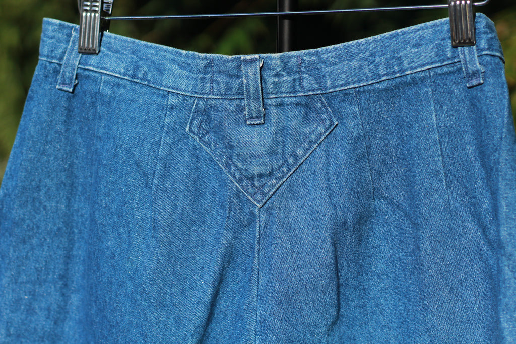 Detail of back waistband and pleats on back of 1990s Lee trouser jeans