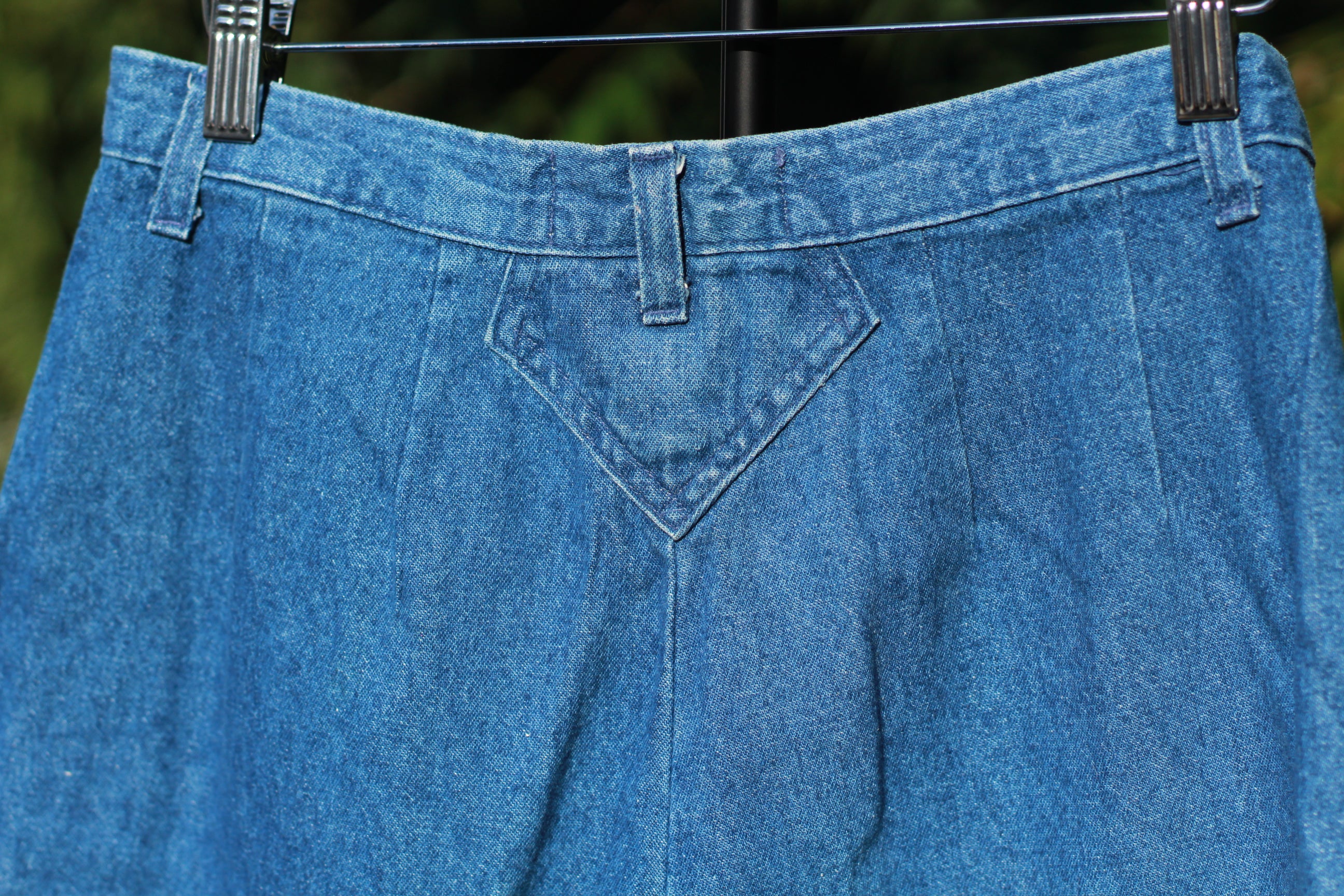 Detail of back waistband and pleats on back of 1990s Lee trouser jeans