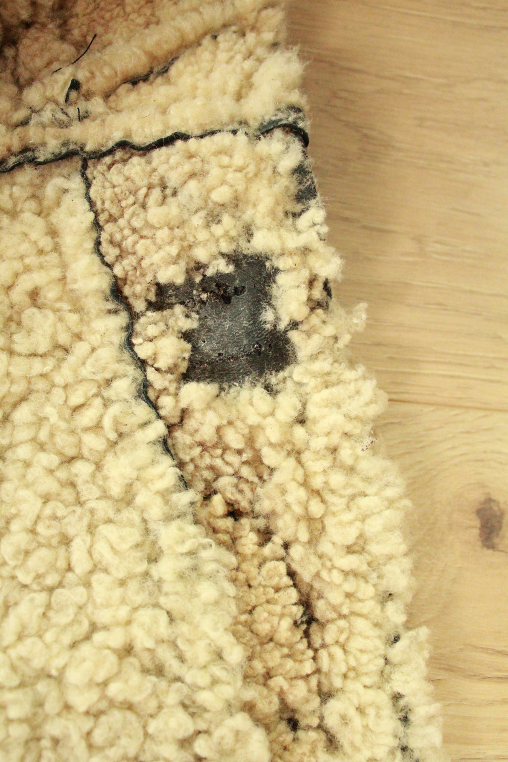 Close-up of wear on inside of Vintage Black B3 Shearling Bomber Jacket