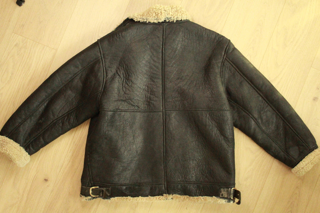 Back view of Vintage Black B3 Shearling Bomber Jacket - flat lay