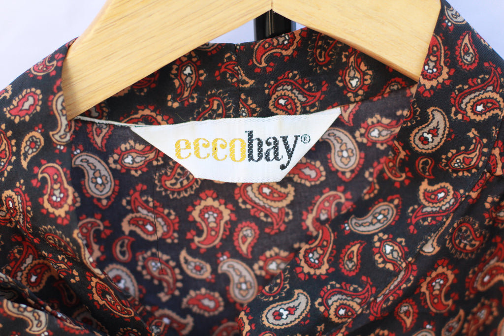 Vintage 70s Paisley Pussy-Bow Blouse – Western Boho Long Sleeve Printed Shirt (Black, Orange, Red)