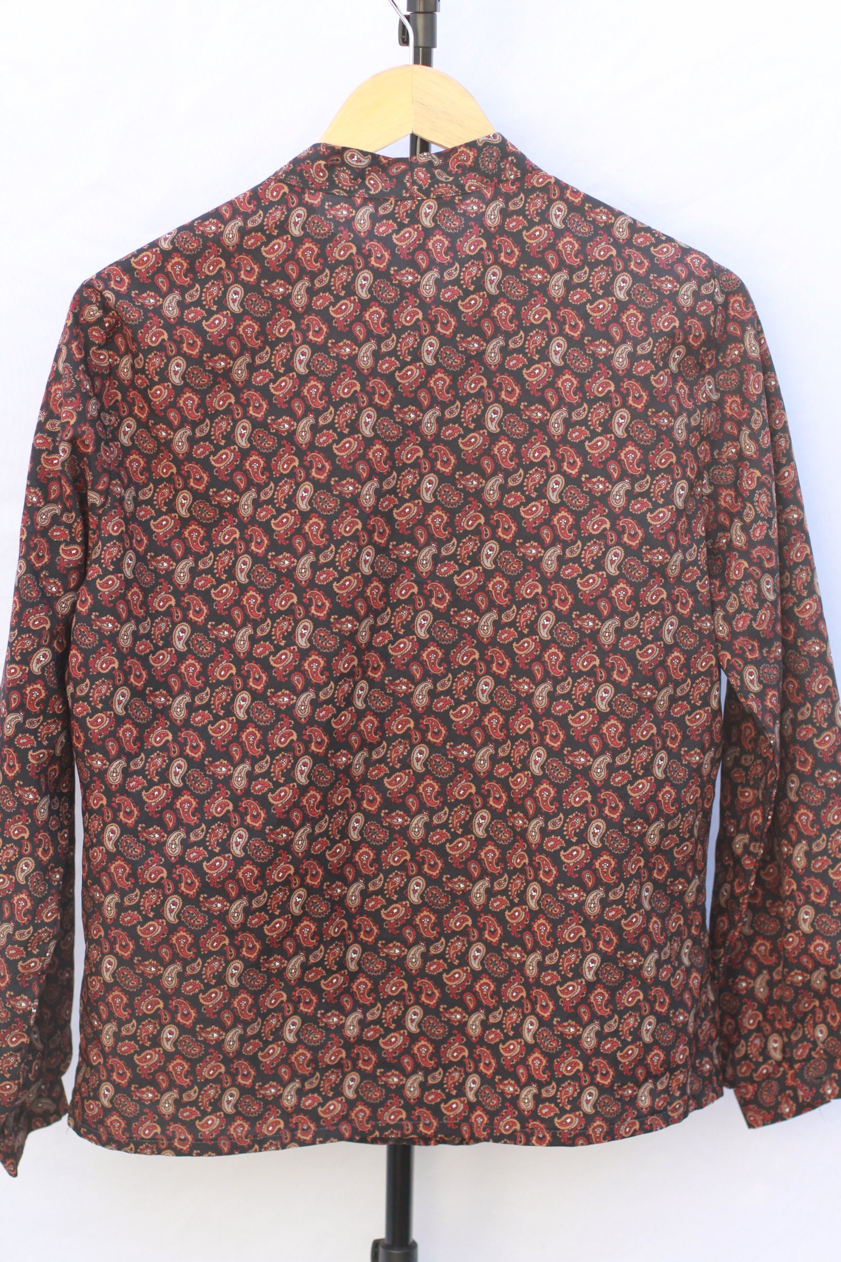 Back view of vintage long sleeve paisley blouse