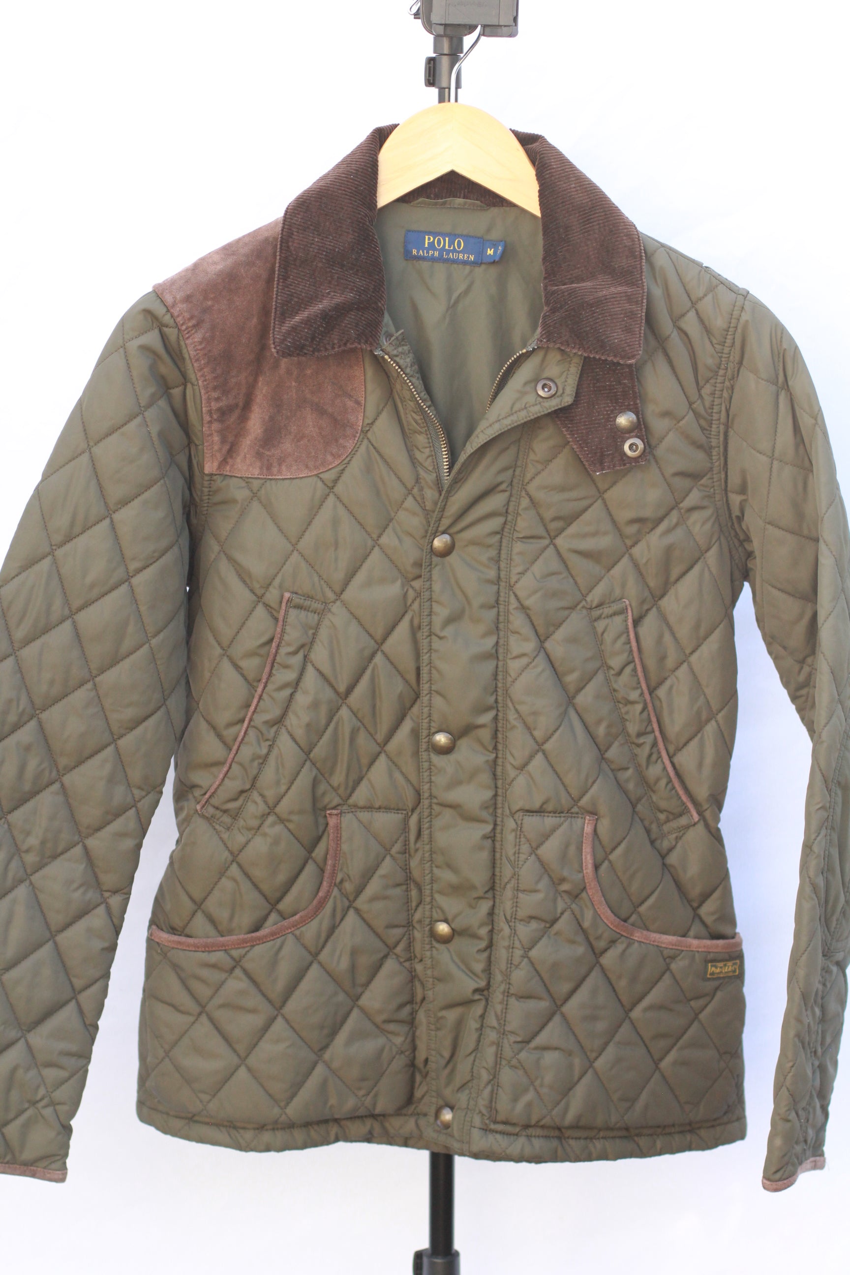 Women’s green quilted Polo Ralph Lauren equestrian jacket front view