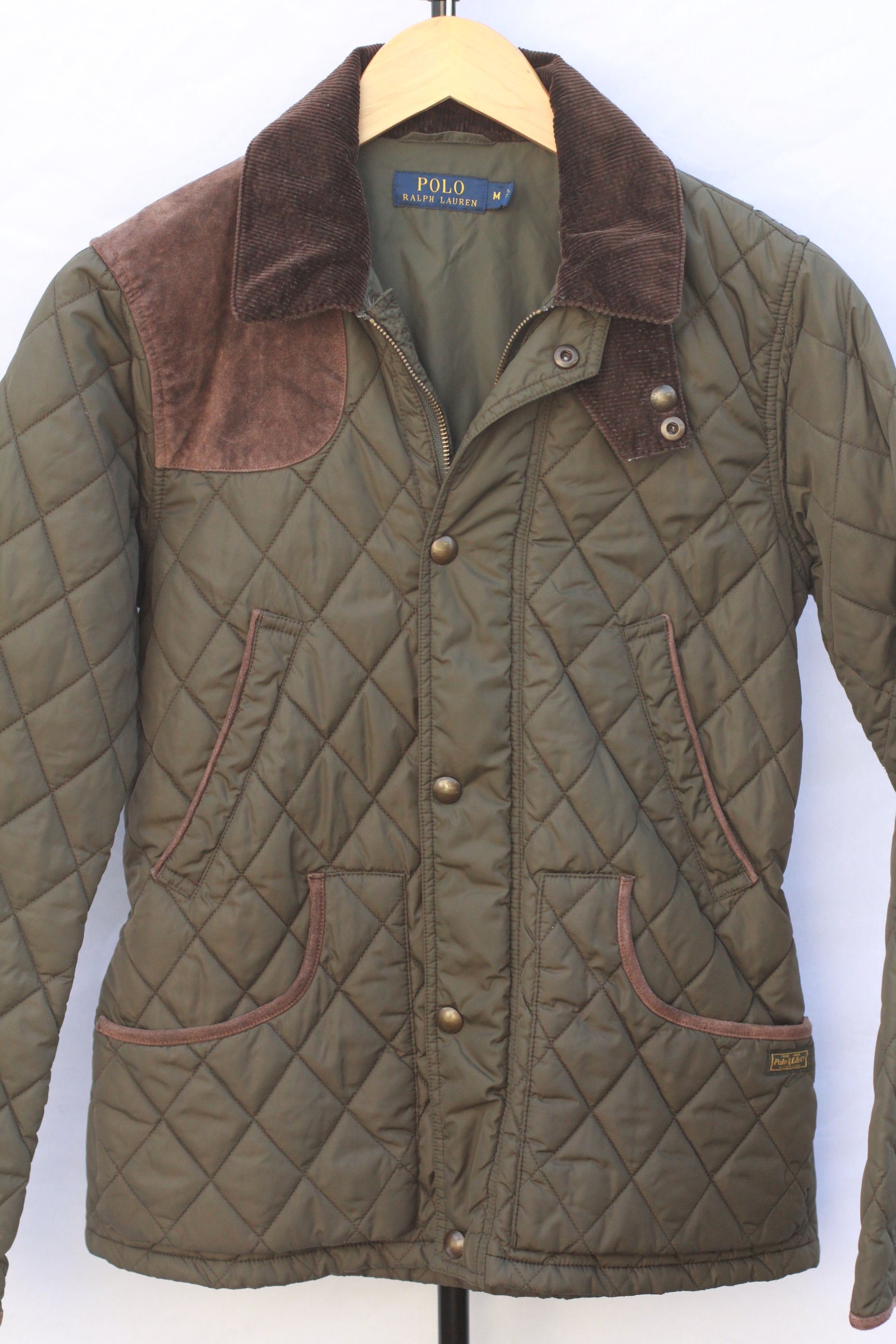 Women’s green quilted Polo Ralph Lauren equestrian jacket front view