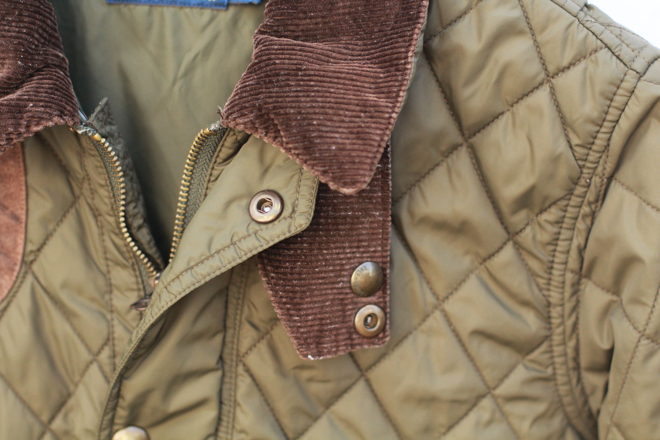 Close-up of corduroy collar and suede trim on Polo Ralph Lauren jacket