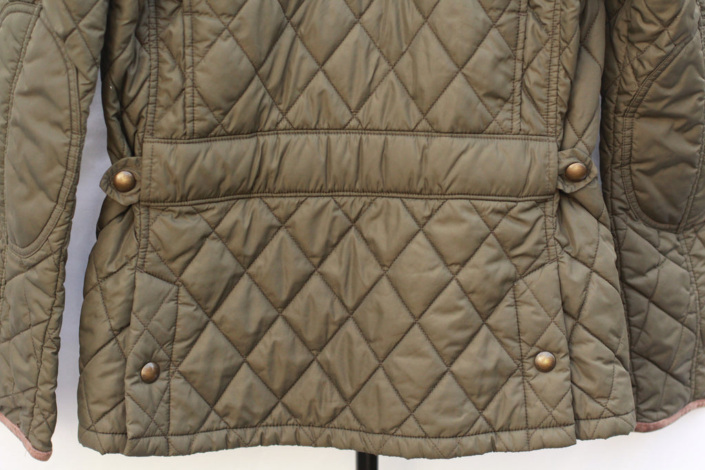 Back view of Polo Ralph Lauren hunter green quilted riding jacket