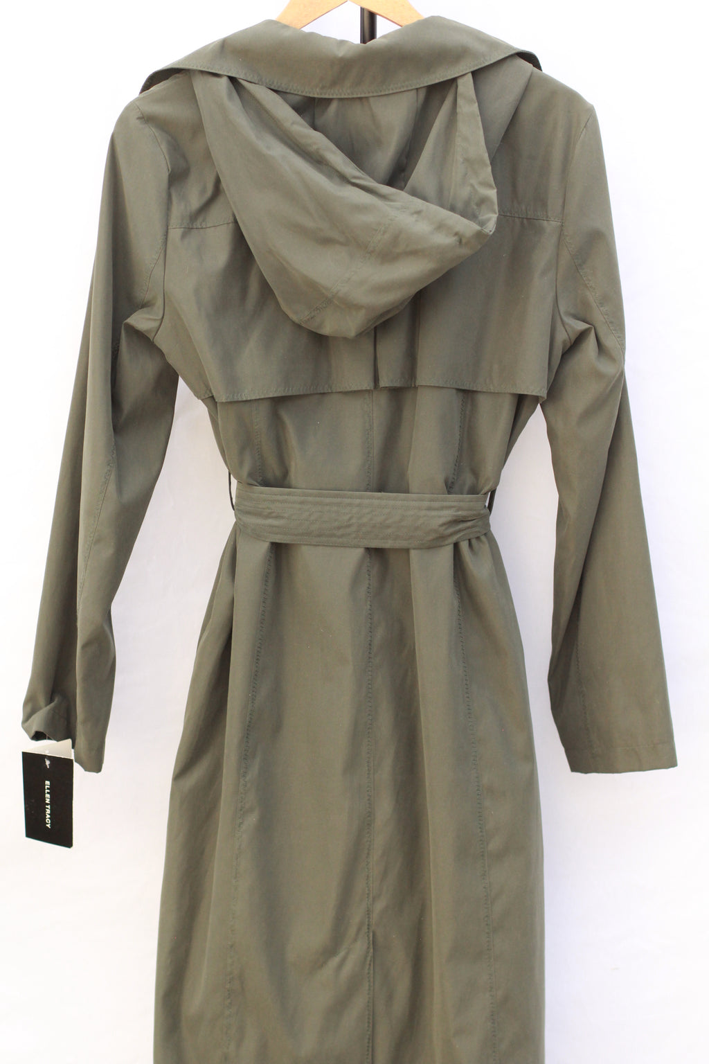 Back view of women’s medium minimalist trench coat