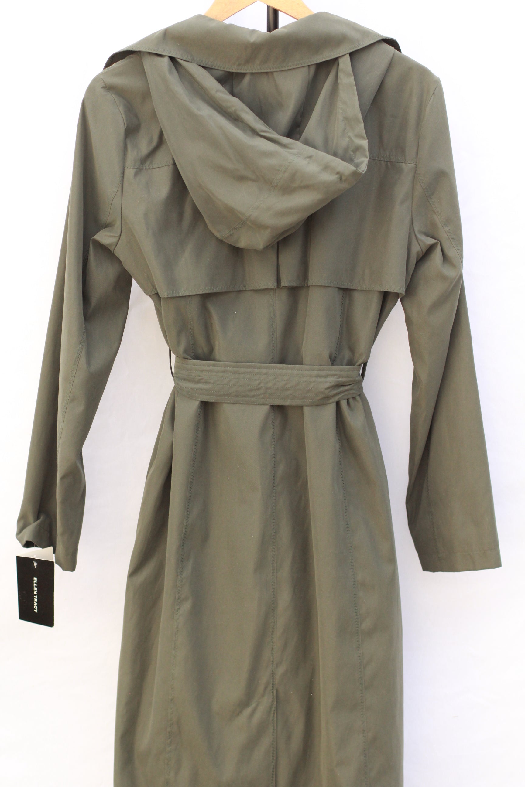 Back view of women’s medium minimalist trench coat