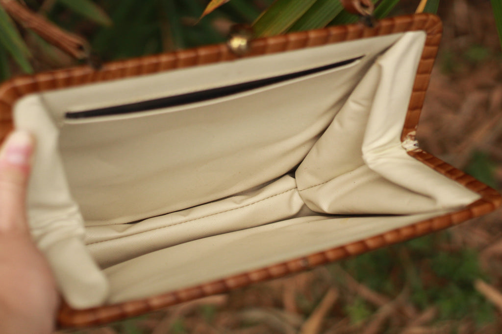 Soft cream interior with inside pocket of vintage leather bag