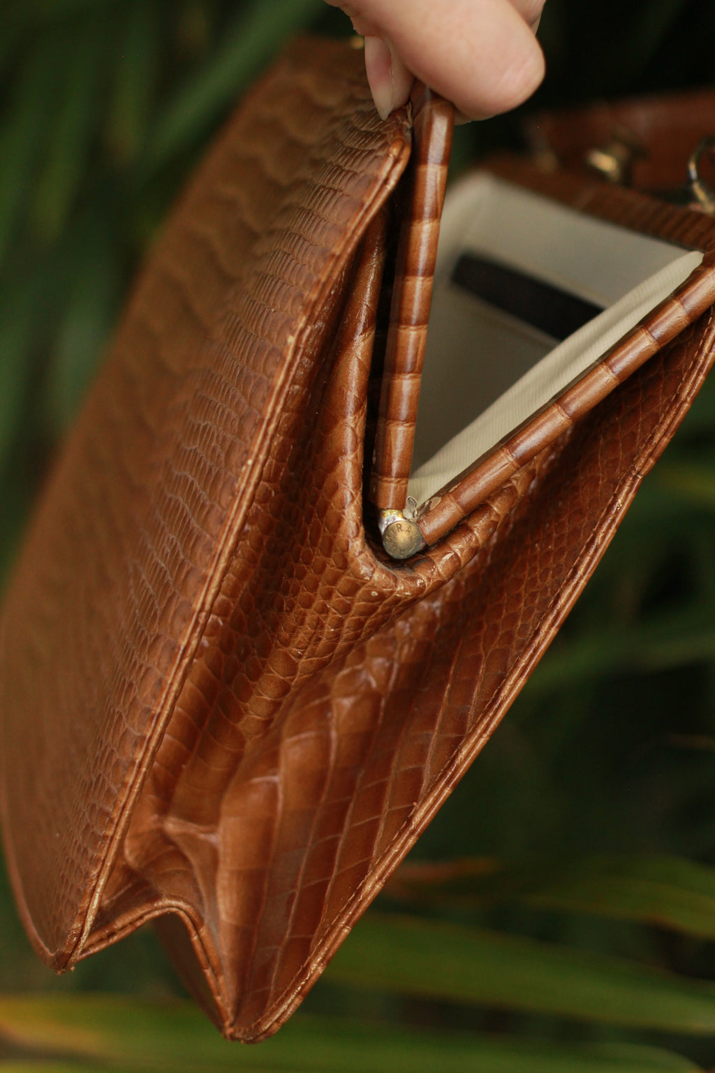 Side view of open 1960s vintage handbag