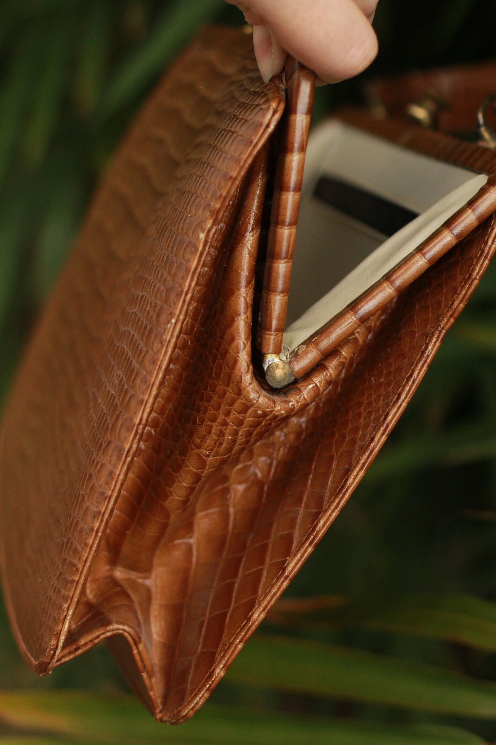 Side view of open 1960s vintage handbag