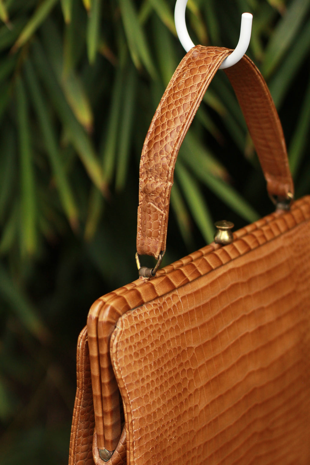 Top-handle of 1960s crocodile embossed leather handbag