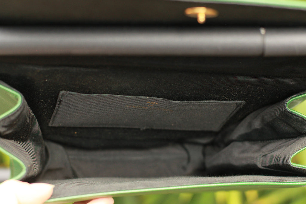 Interior of vintage green leather purse