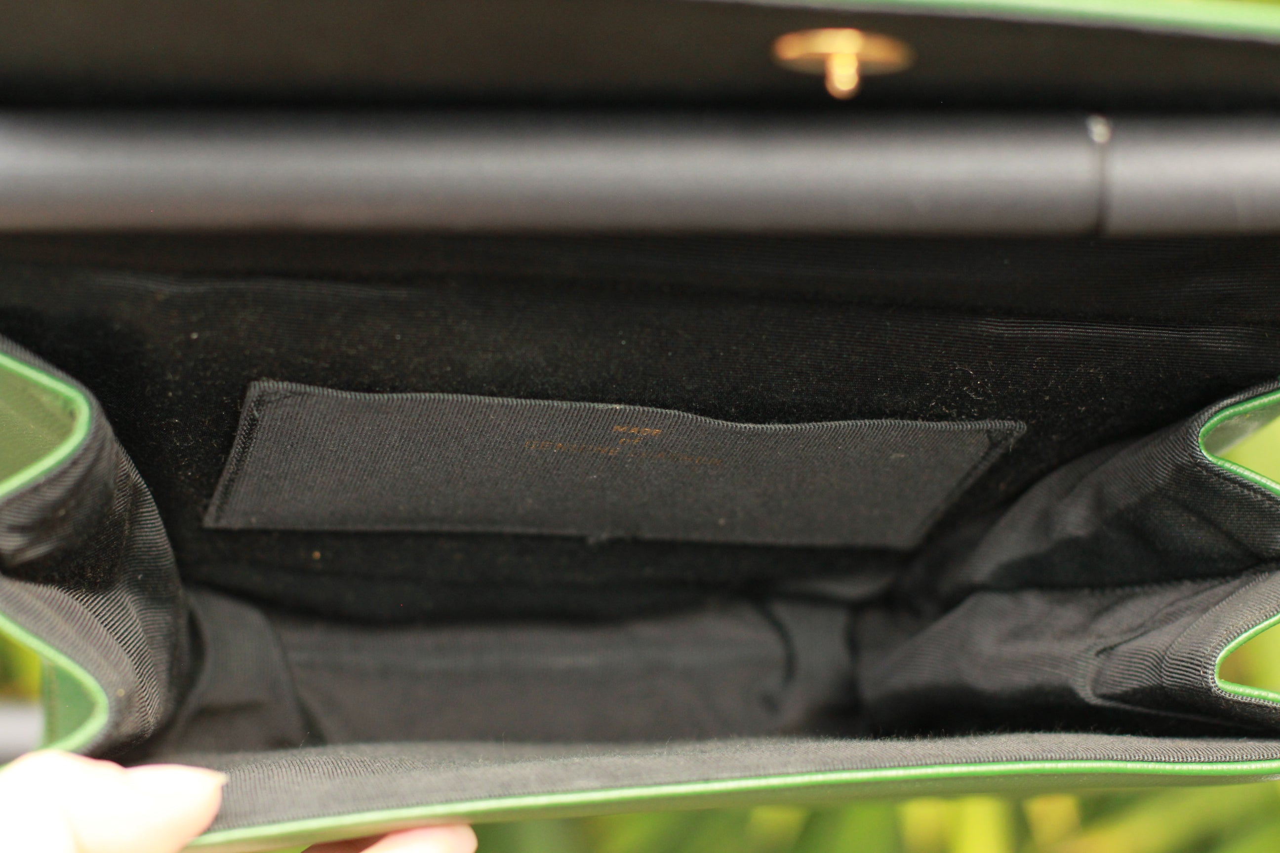 Interior of vintage green leather purse