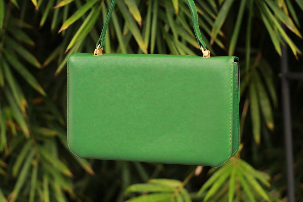 Back view of vintage 1990s green leather handbag