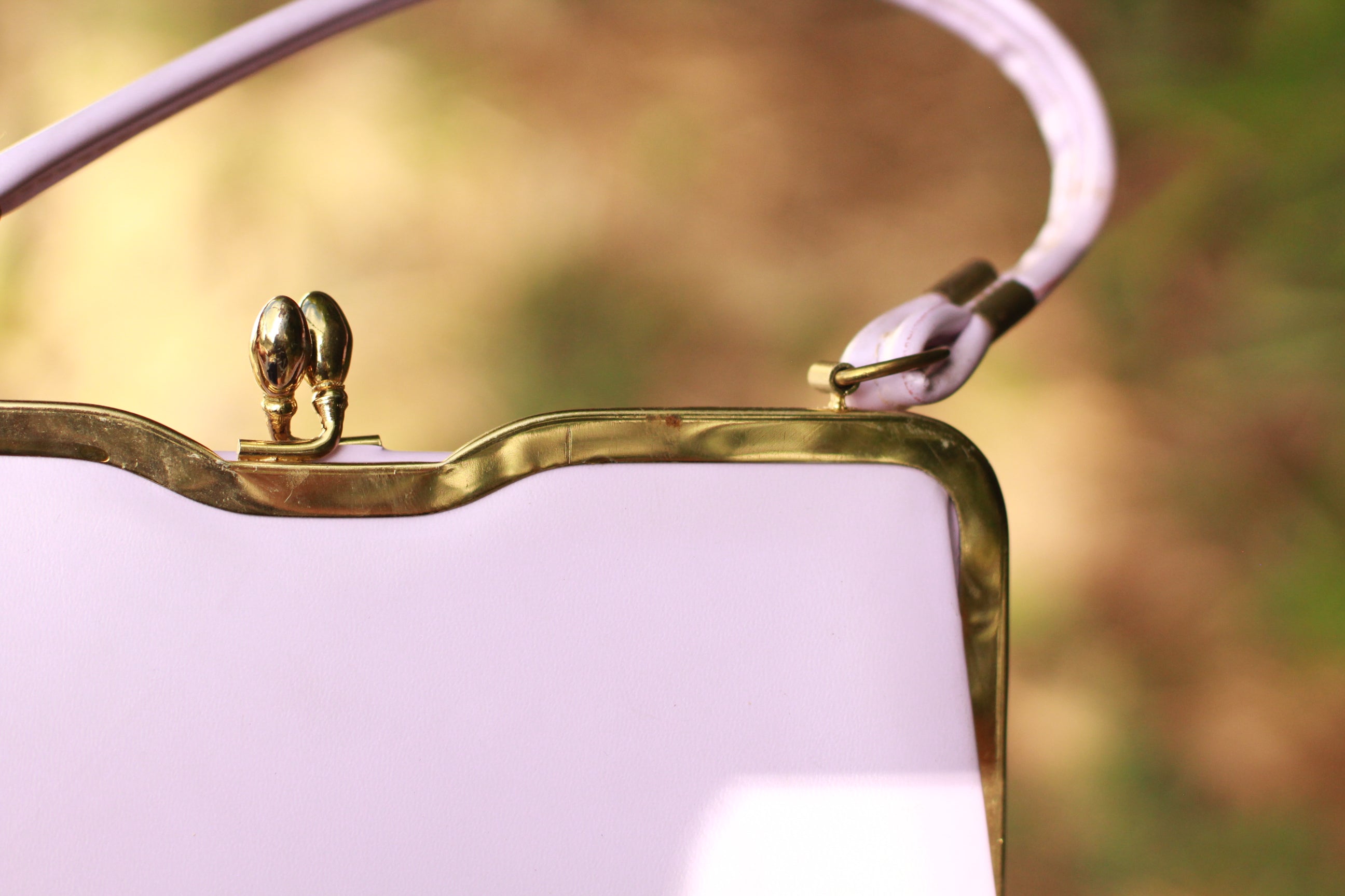 Detail of minor blemish and gold hardware