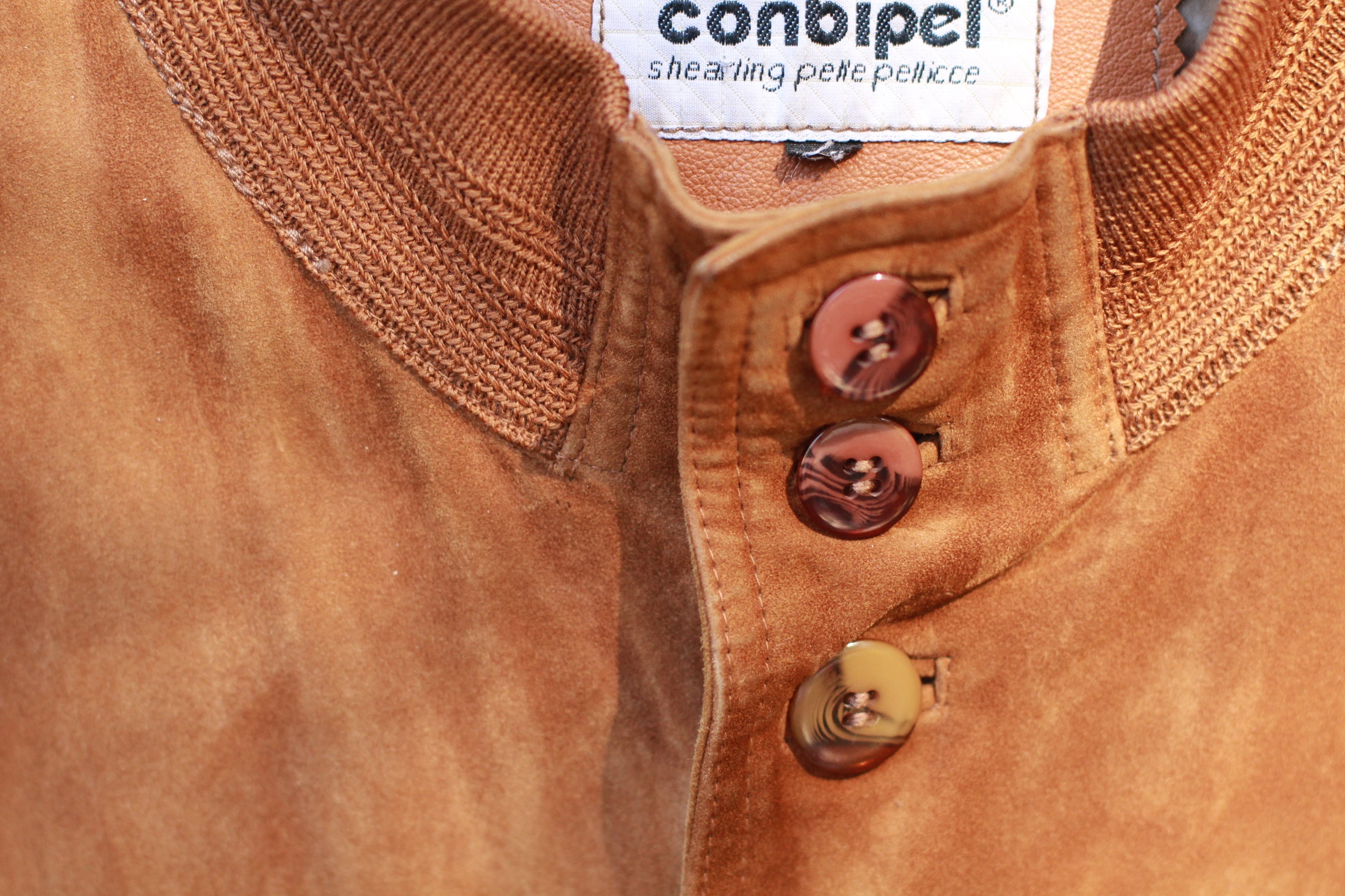 Close-up of neckline and buttons on vintage Italian Conbipel jacket