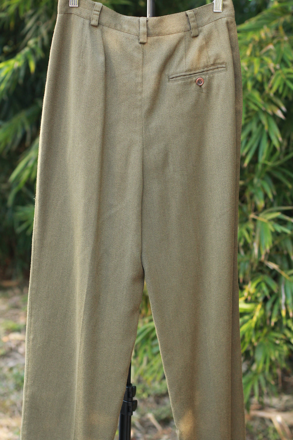 Back view of 1990s olive green high-rise trousers