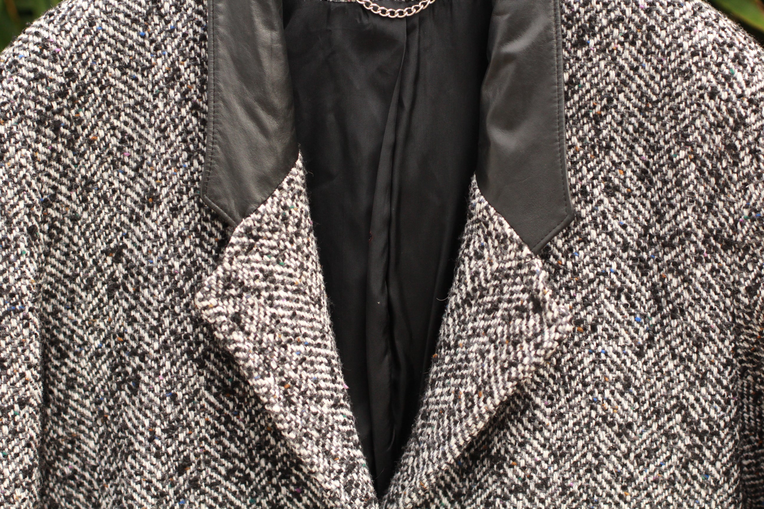 Close-up of leather lapels on vintage tweed coat, Union Made USA