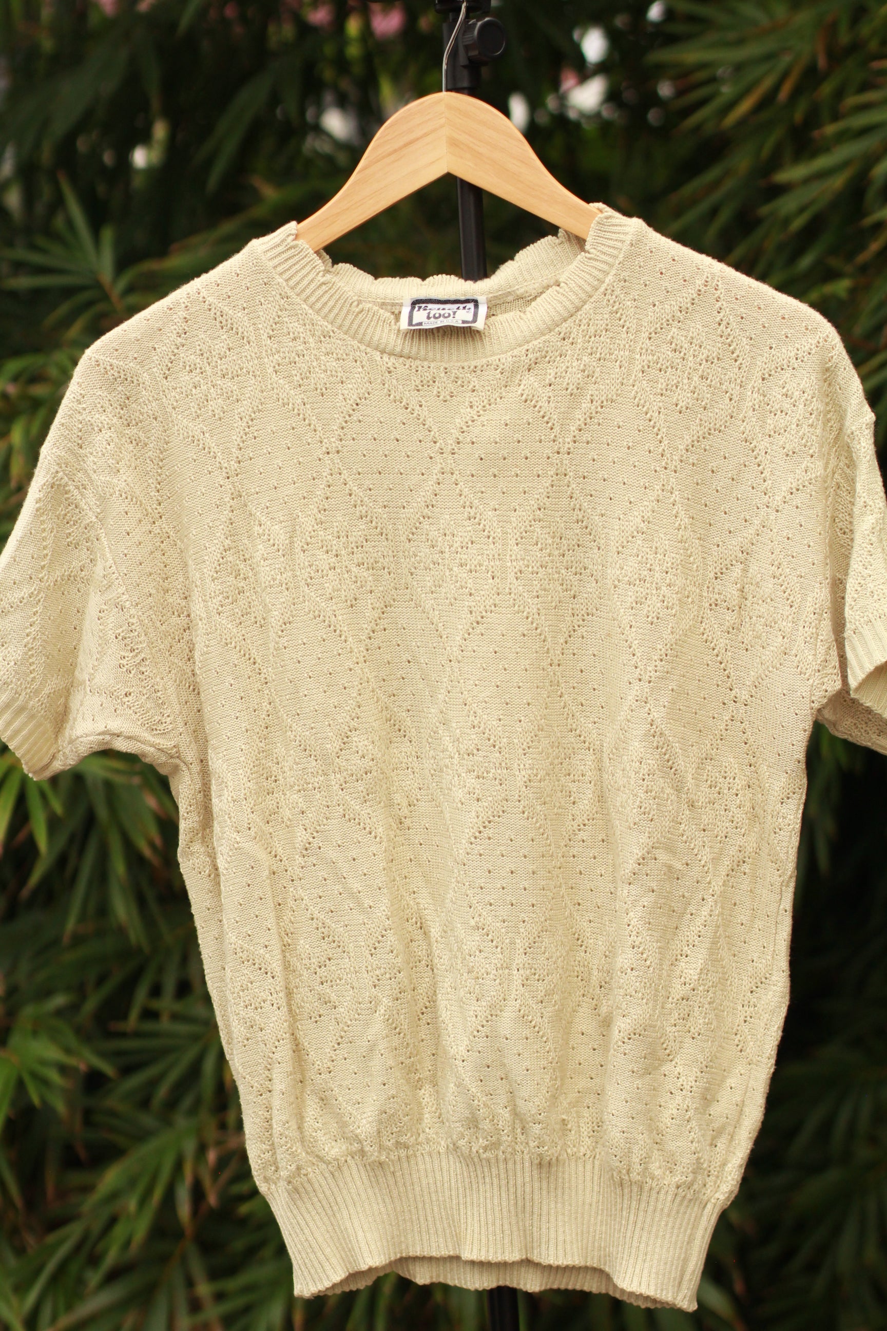 Front view of retro beige knit top