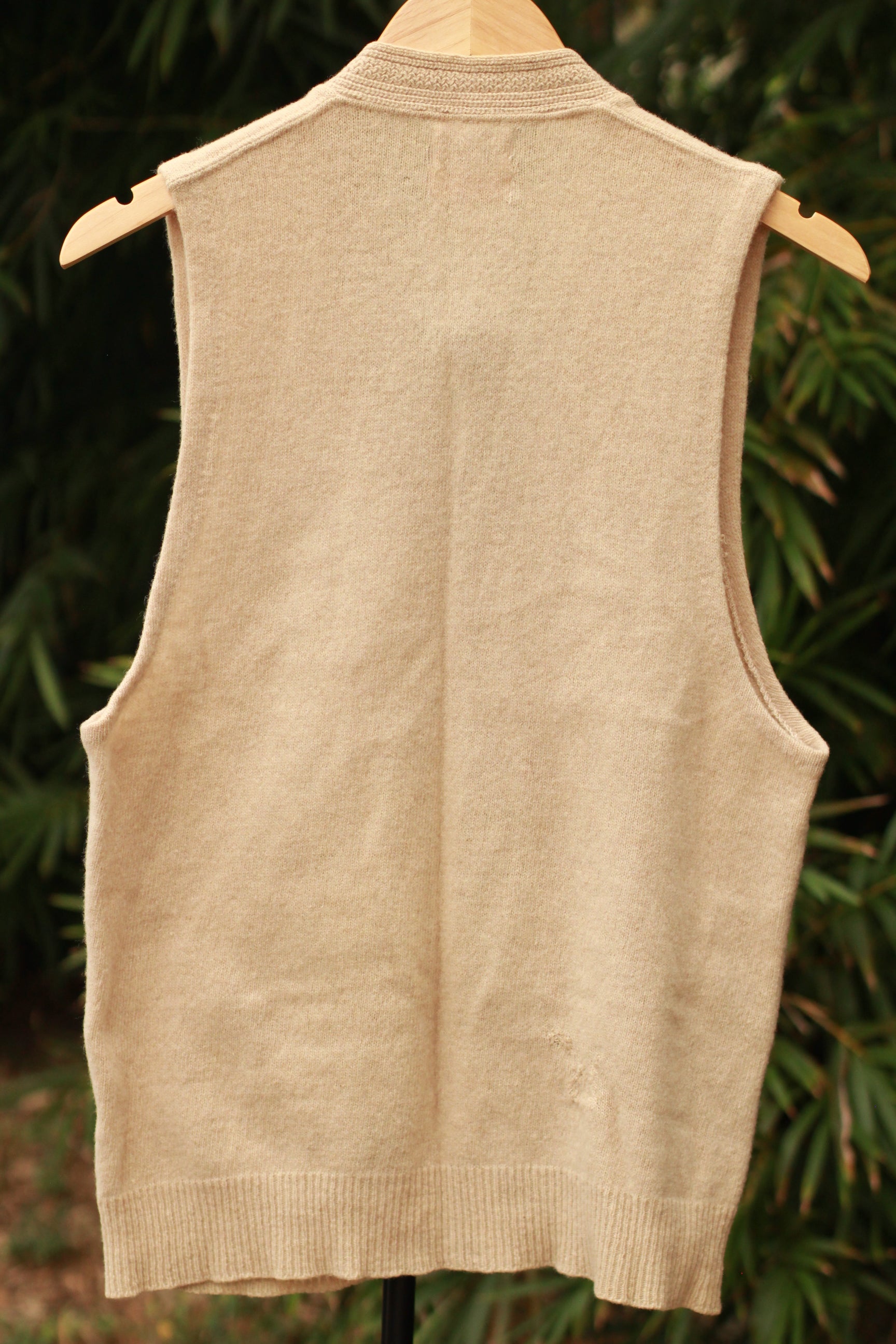 Back view of 1960s beige wool sweater vest