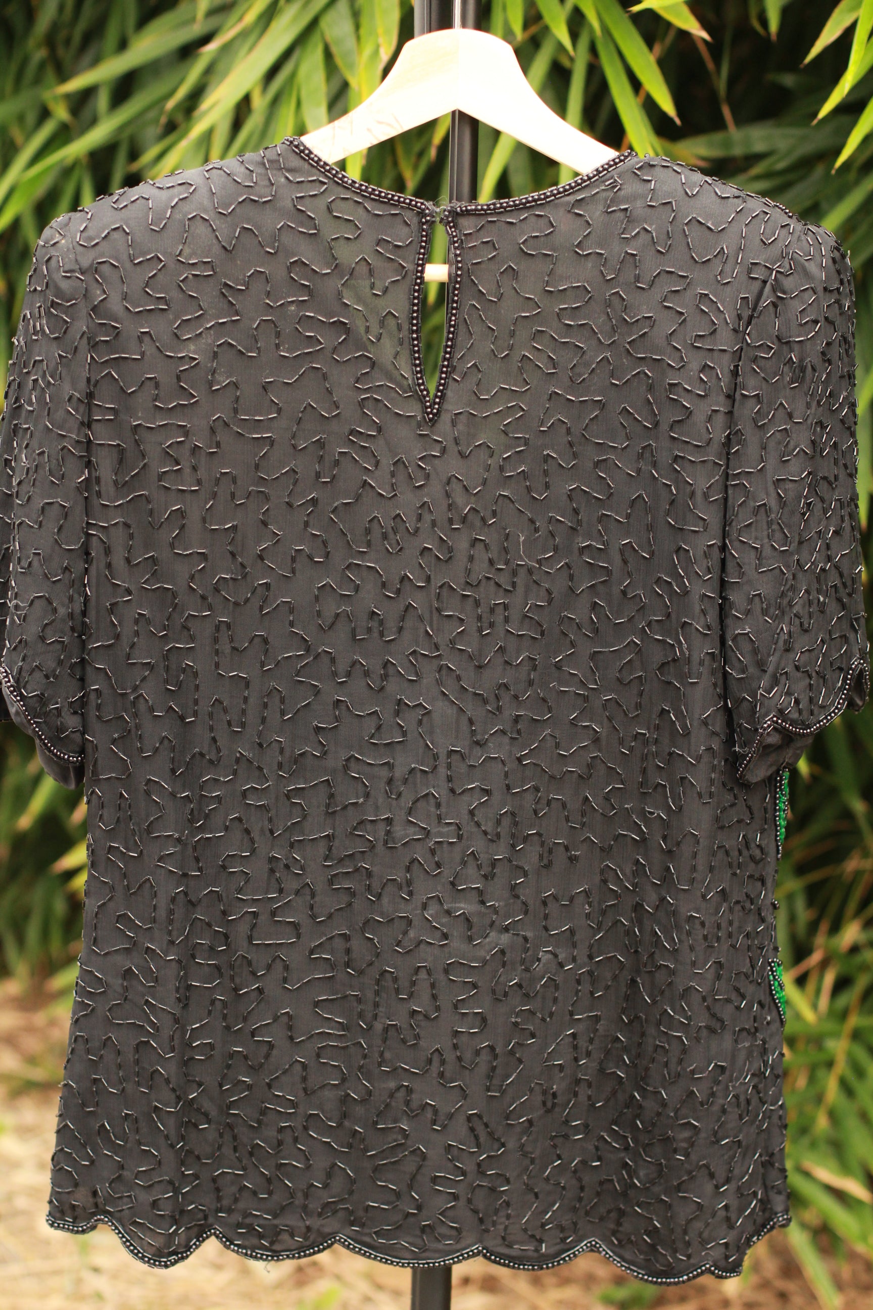Back view showing hook-and-eye closure on 1980s Laurence Kazar blouse