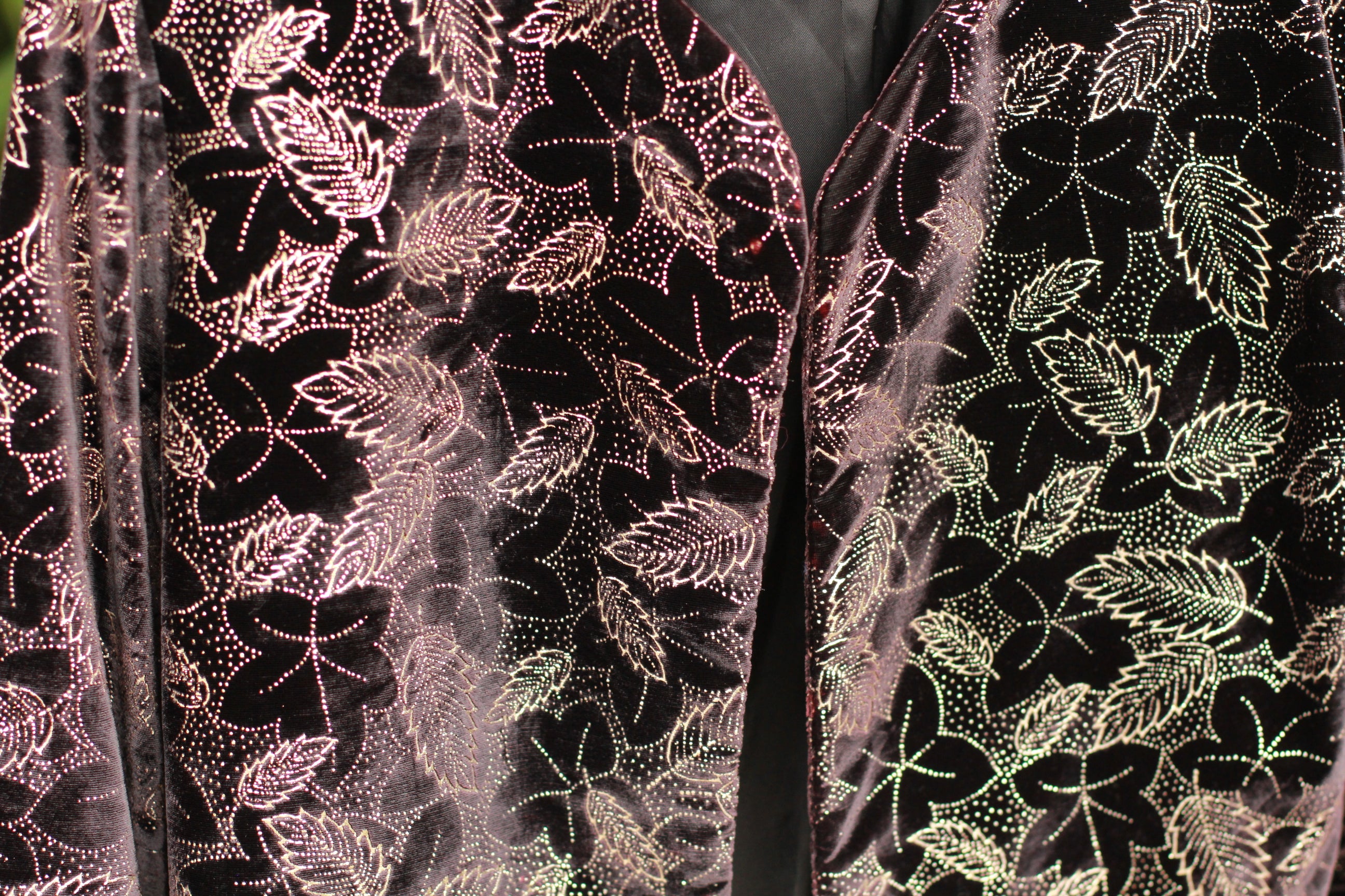 Metallic silver glitter leaf and dot pattern on 1980s velvet jacket