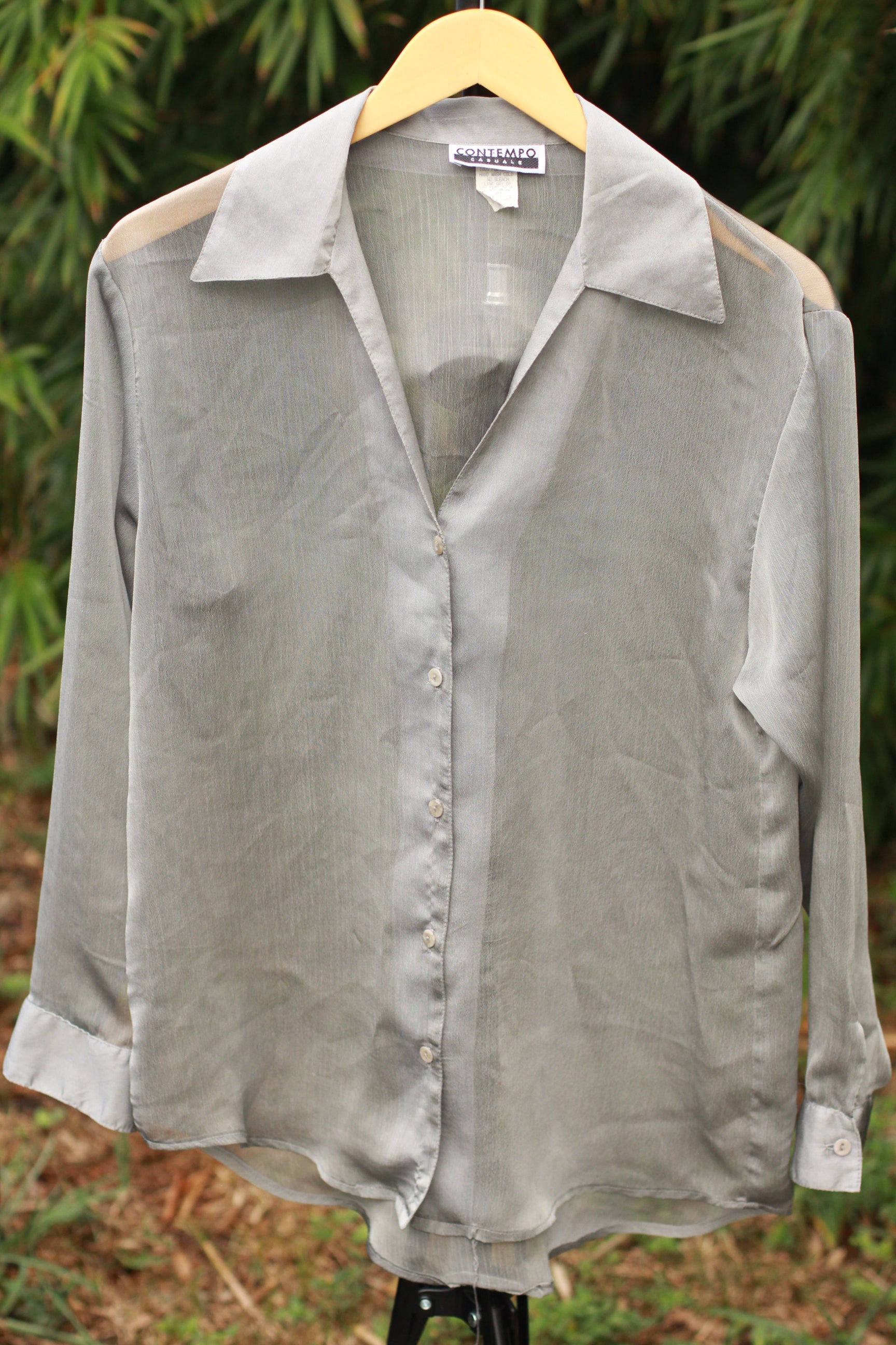 Vintage sheer gray chiffon button-down blouse – front view on hanger