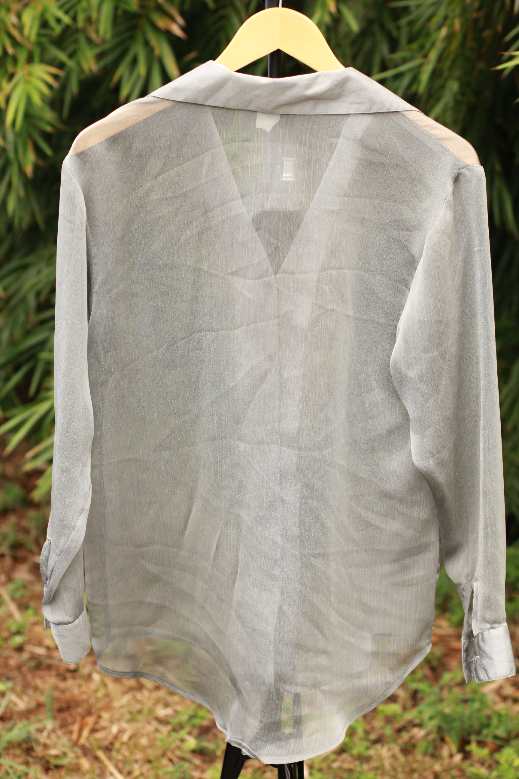 Back view of vintage minimal gray chiffon blouse