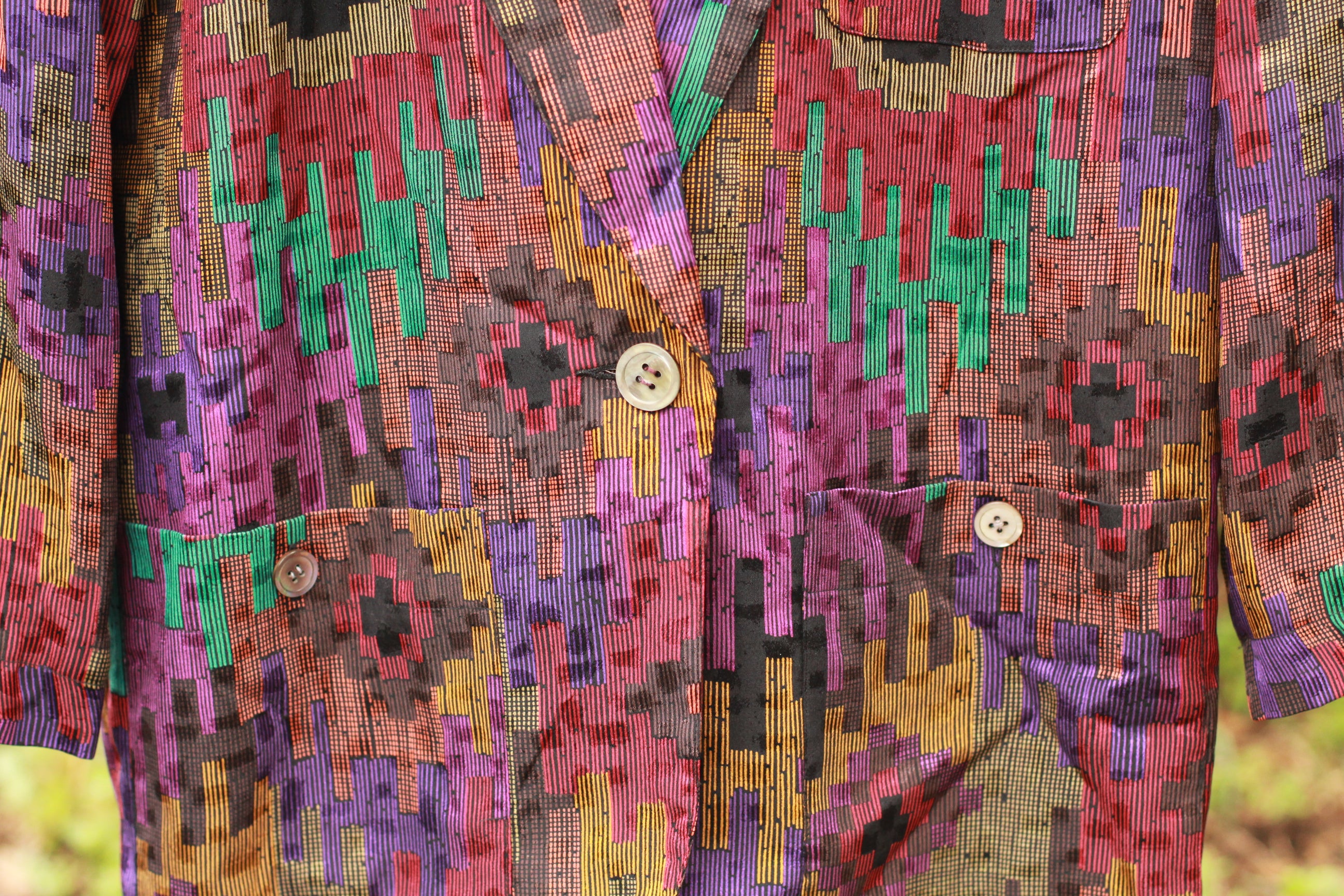 Close-up of Aztec style print fabric on Anne Klein II vintage jacket