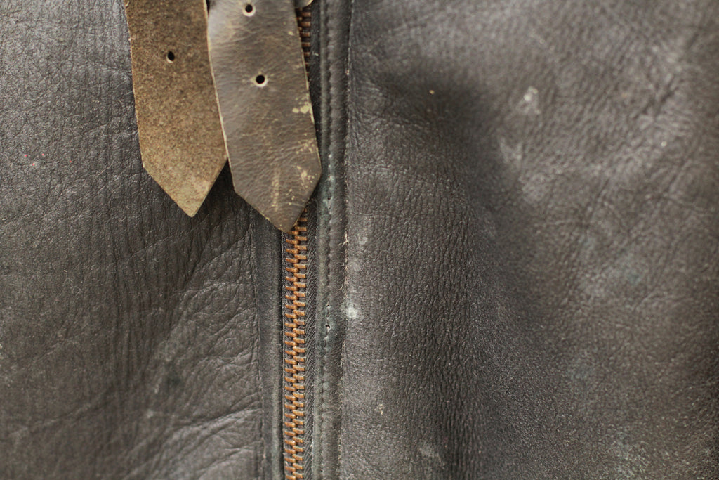 Close-up of natural wear along zipper on Vintage Black B3 Shearling Bomber Jacket