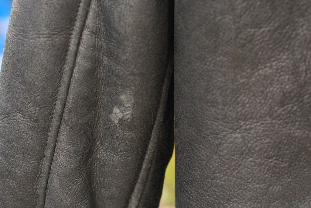 Close-up of natural wear on inside arm of Vintage Black B3 Shearling Bomber Jacket