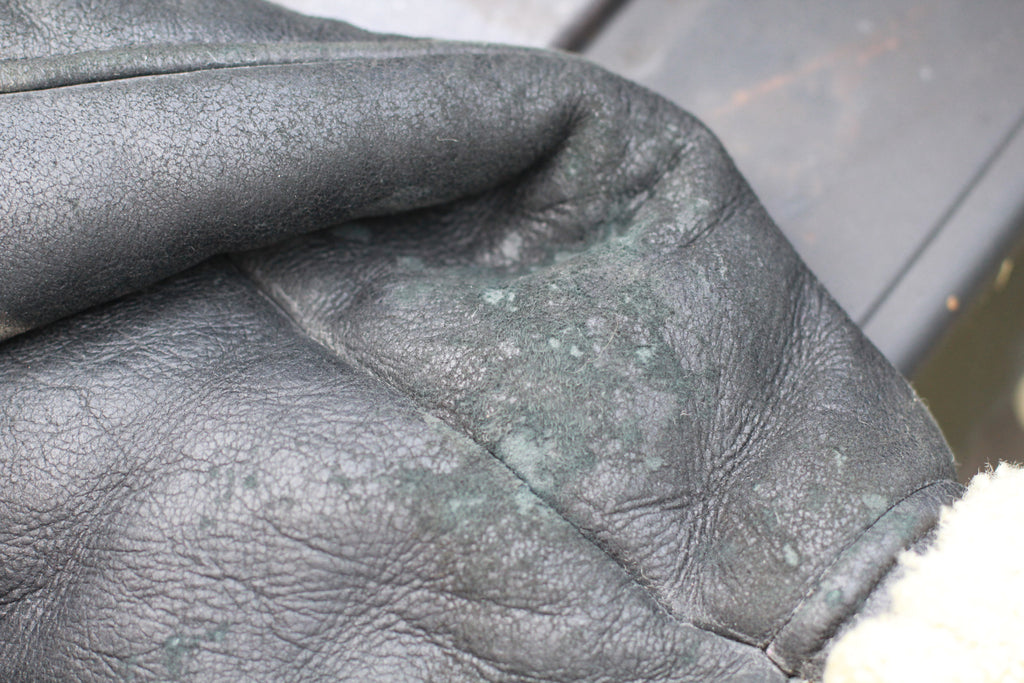 Close up of natural wear on arm cuff of Vintage Black B3 Shearling Bomber Jacket