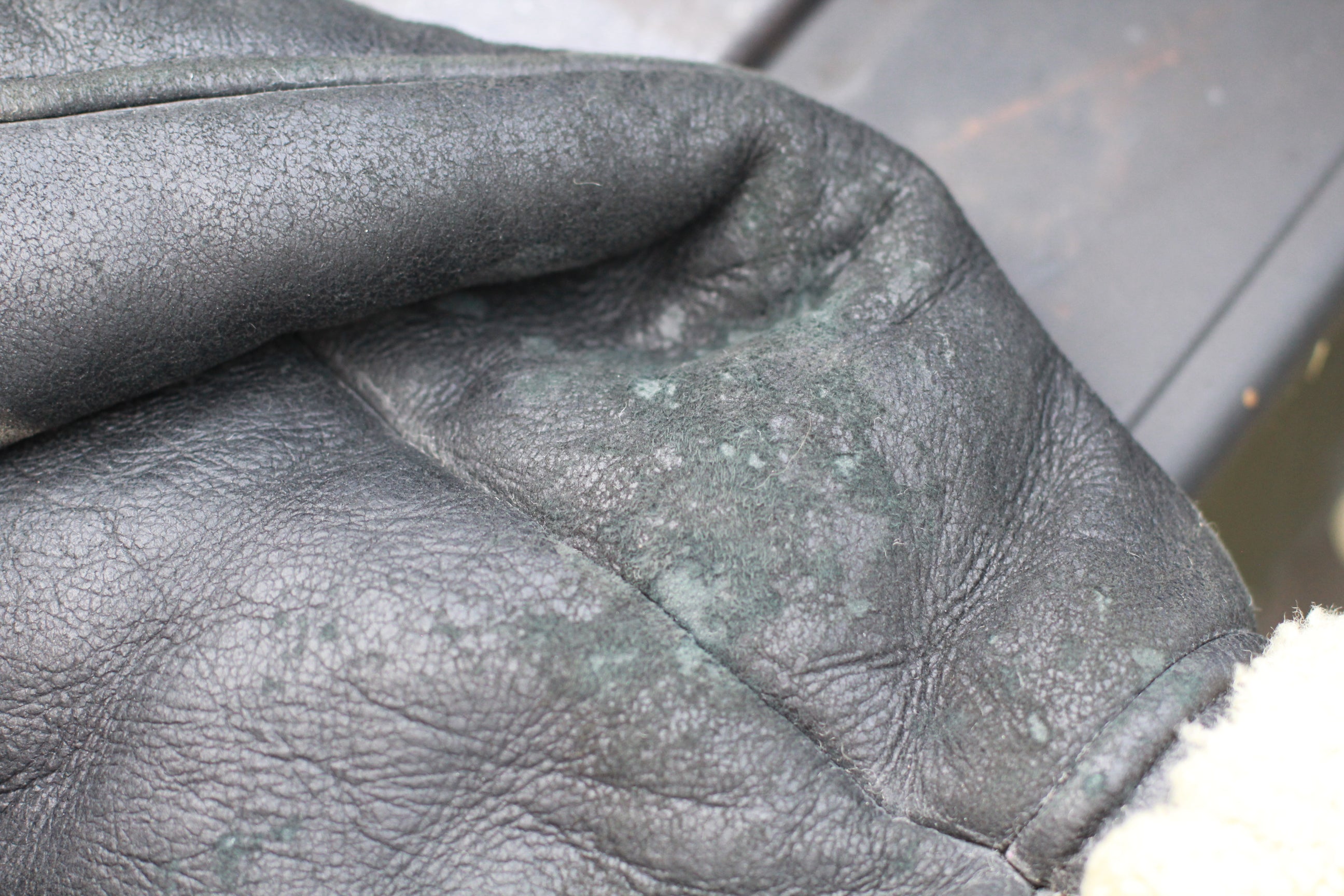 Close up of natural wear on arm cuff of Vintage Black B3 Shearling Bomber Jacket
