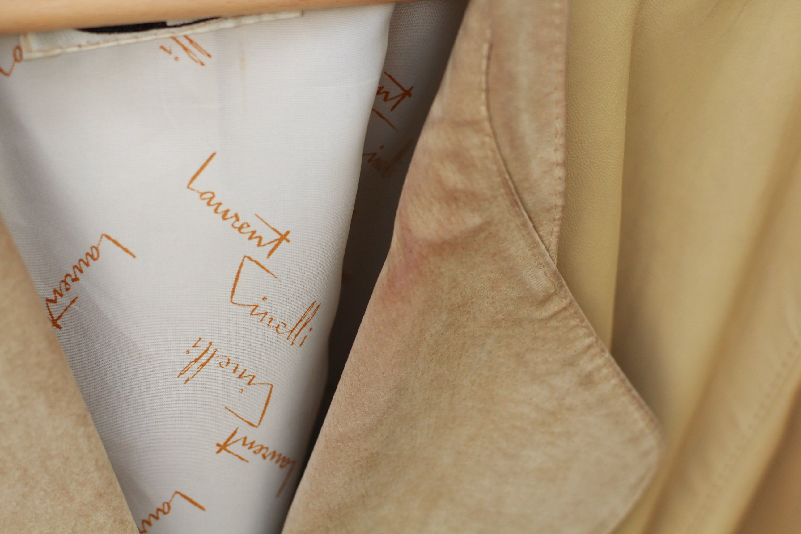 close-up of discoloration on vintage leather lie-belt jacket