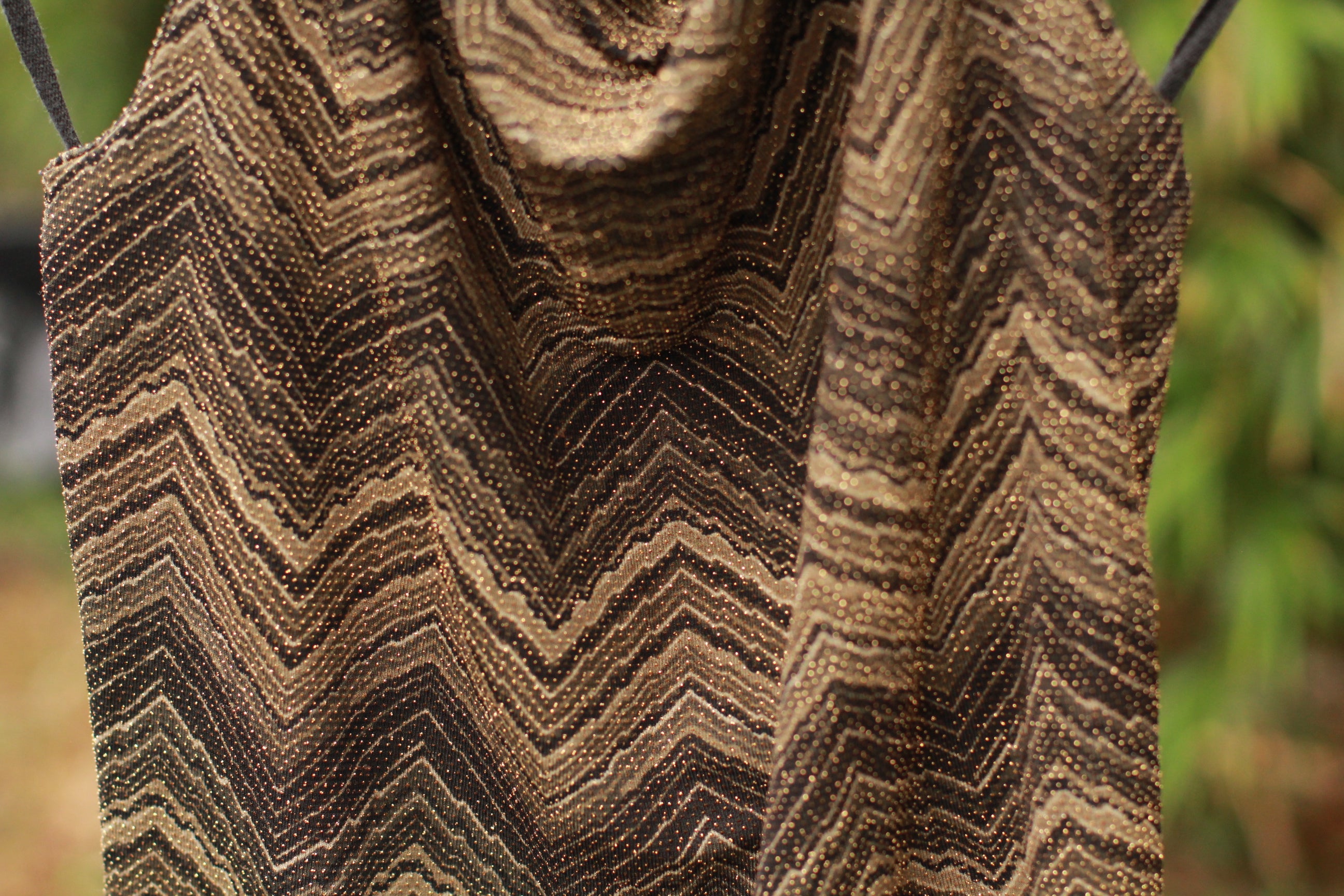 Close-up of gold lurex detail and material on vintage 90s/Y2K cowl neck halter top