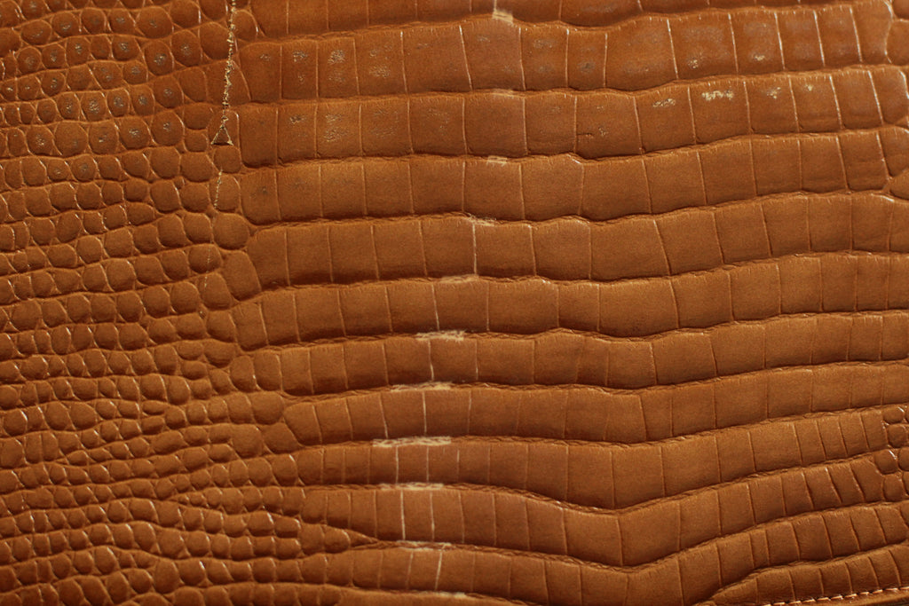 Close-up showing marks on backside of vintage 1960s handbag