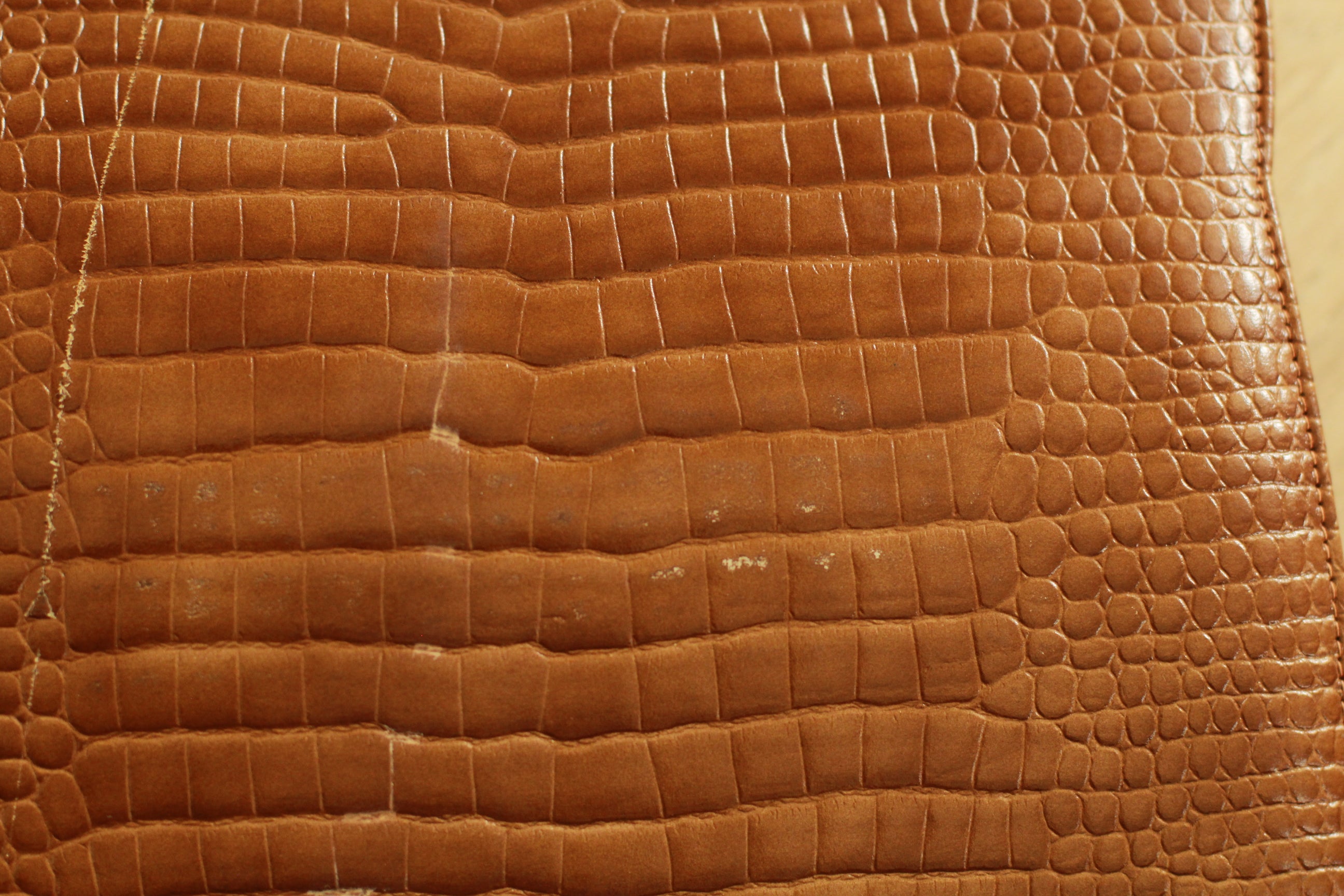 Close-up showing minor vintage marks on 1960s bag - back view