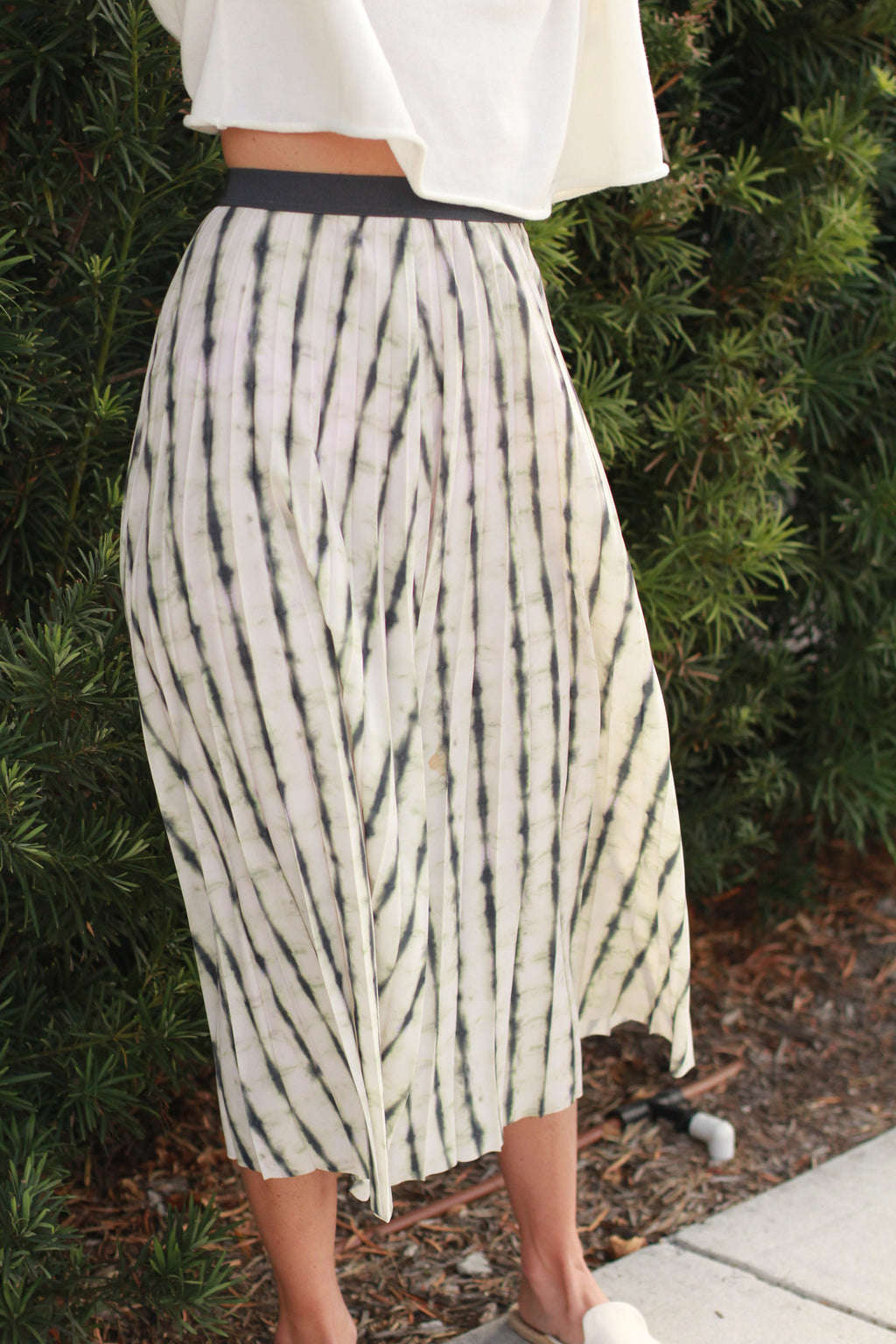 Movement of skirt — flowy pleated fabric