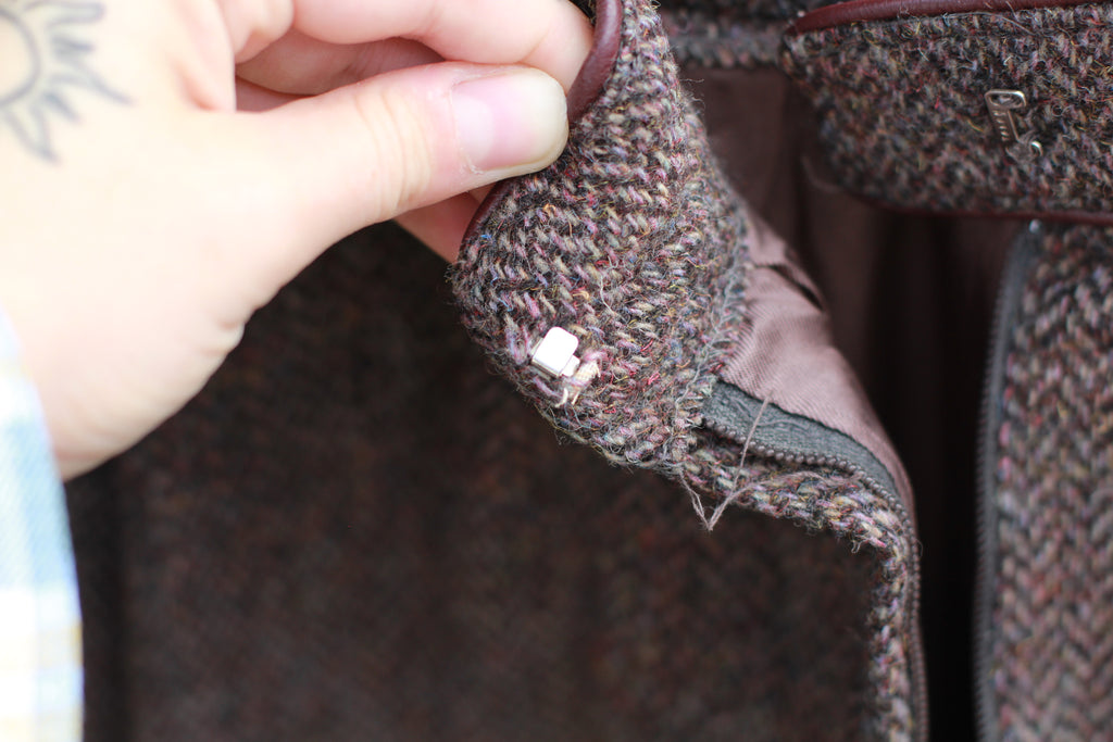 Detail of closure and texture of tweed fabric